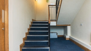 Stairs to second floor of Occupli Little Island to training rooms
